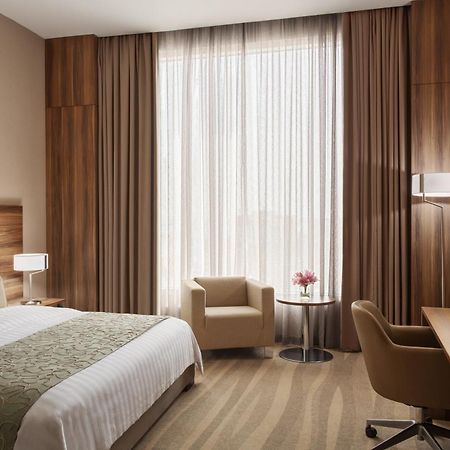 เบย์ ลา ซัน โฮเต็ล แอนด์ มารีนา Hotel King Abdullah Economic City ภายนอก รูปภาพ A room at the hotel