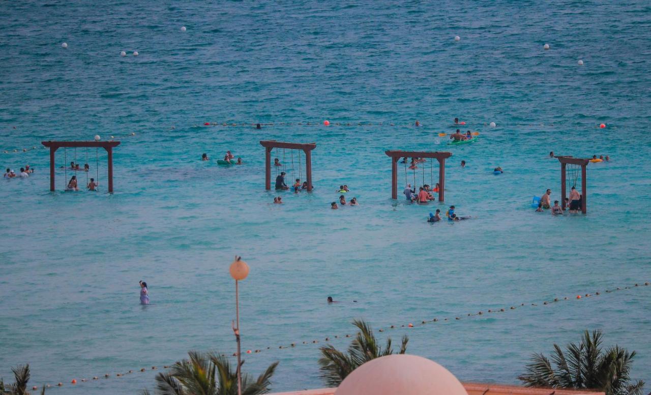 เบย์ ลา ซัน โฮเต็ล แอนด์ มารีนา Hotel King Abdullah Economic City ภายนอก รูปภาพ The beach at the Dead Sea