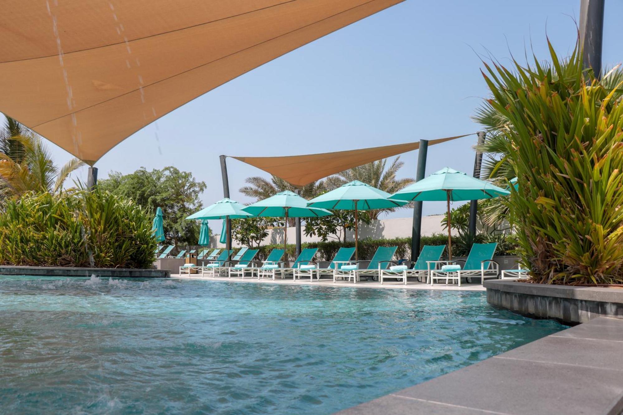 เบย์ ลา ซัน โฮเต็ล แอนด์ มารีนา Hotel King Abdullah Economic City ภายนอก รูปภาพ The swimming pool at the hotel