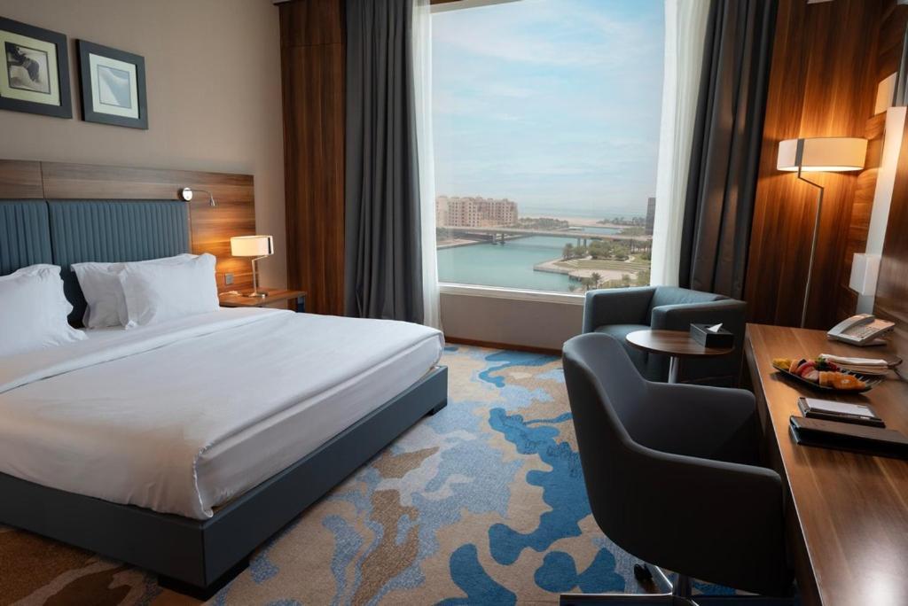 เบย์ ลา ซัน โฮเต็ล แอนด์ มารีนา Hotel King Abdullah Economic City ภายนอก รูปภาพ A room at the hotel