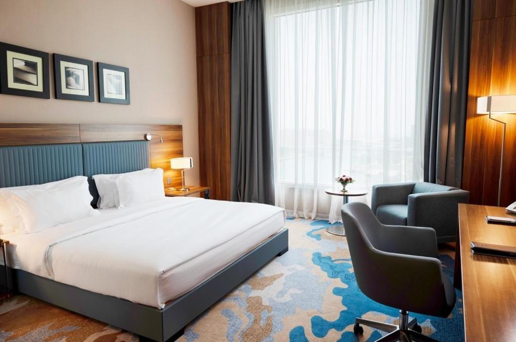 เบย์ ลา ซัน โฮเต็ล แอนด์ มารีนา Hotel King Abdullah Economic City ภายนอก รูปภาพ A room at the hotel
