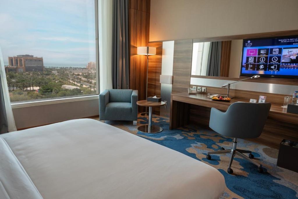 เบย์ ลา ซัน โฮเต็ล แอนด์ มารีนา Hotel King Abdullah Economic City ภายนอก รูปภาพ A room at the hotel