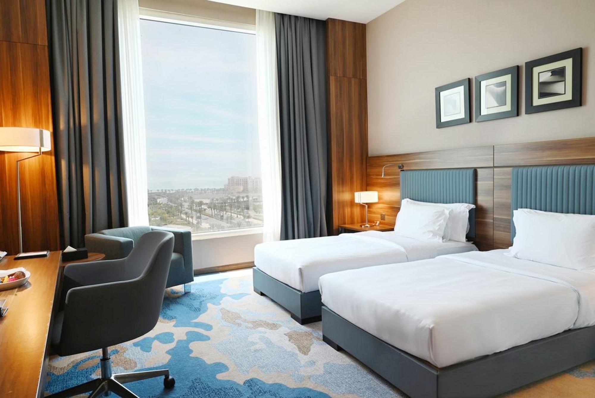เบย์ ลา ซัน โฮเต็ล แอนด์ มารีนา Hotel King Abdullah Economic City ภายนอก รูปภาพ A room at the hotel